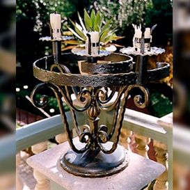 Ferroller candelabro